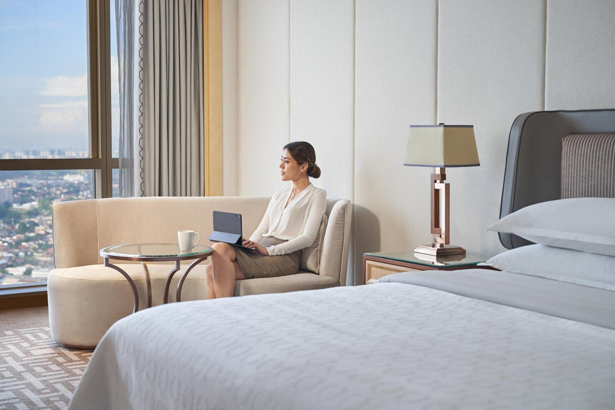 Sheraton Petaling Jaya Hotel Exterior photo A guest in a room at the hotel
